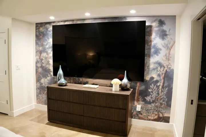 Media wall with patterned wallpaper